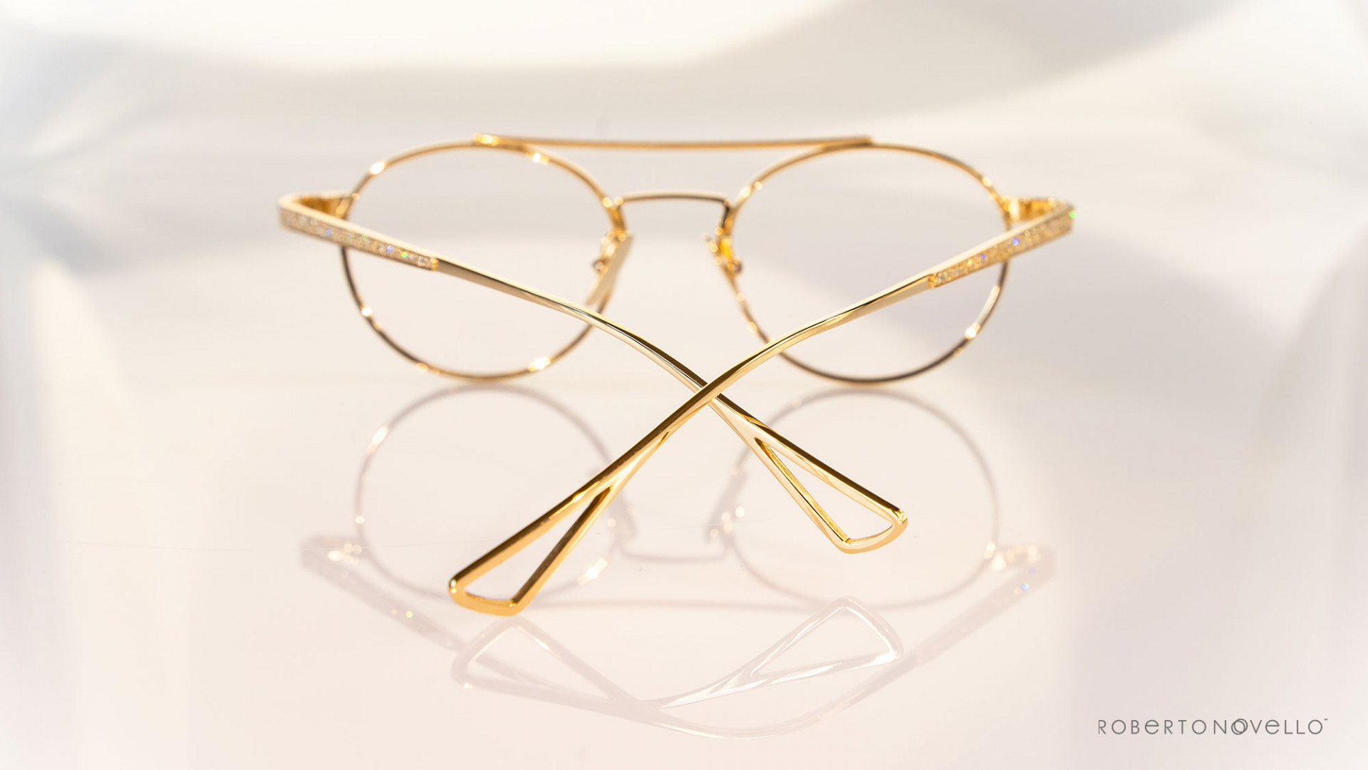 golden glasses with precious stones