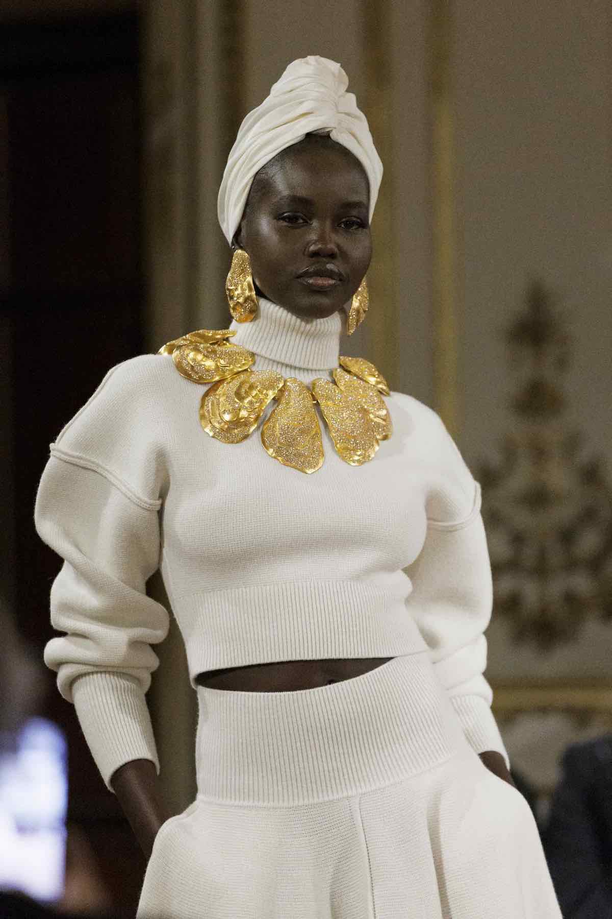 schiaparelli fashion show model close up gold necklace