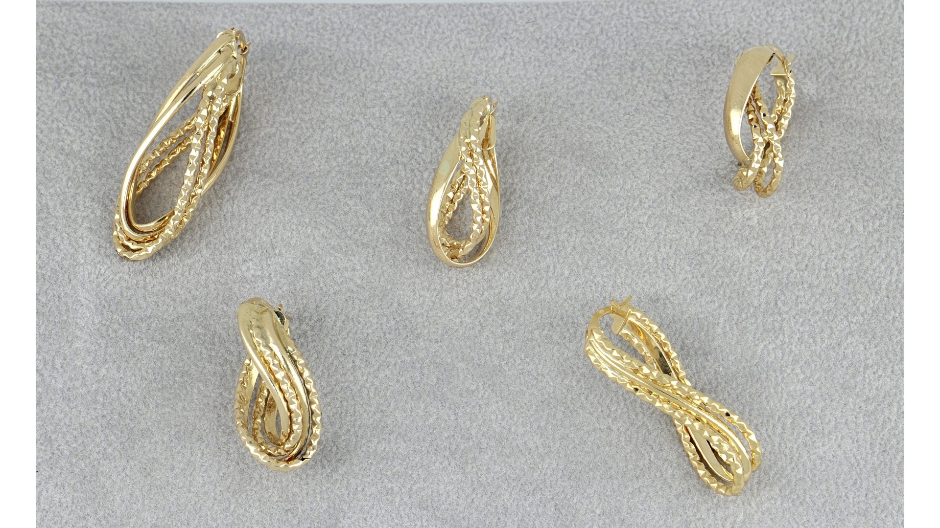 set of gold earrings