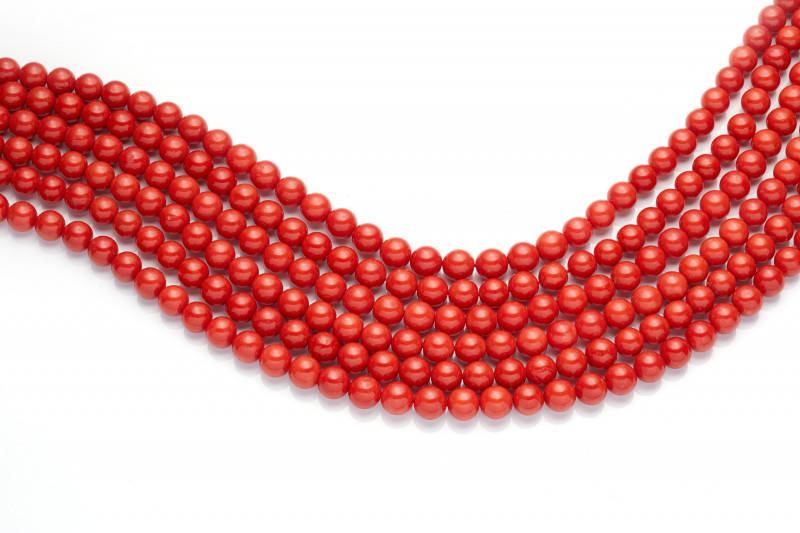 red necklaces with pearls