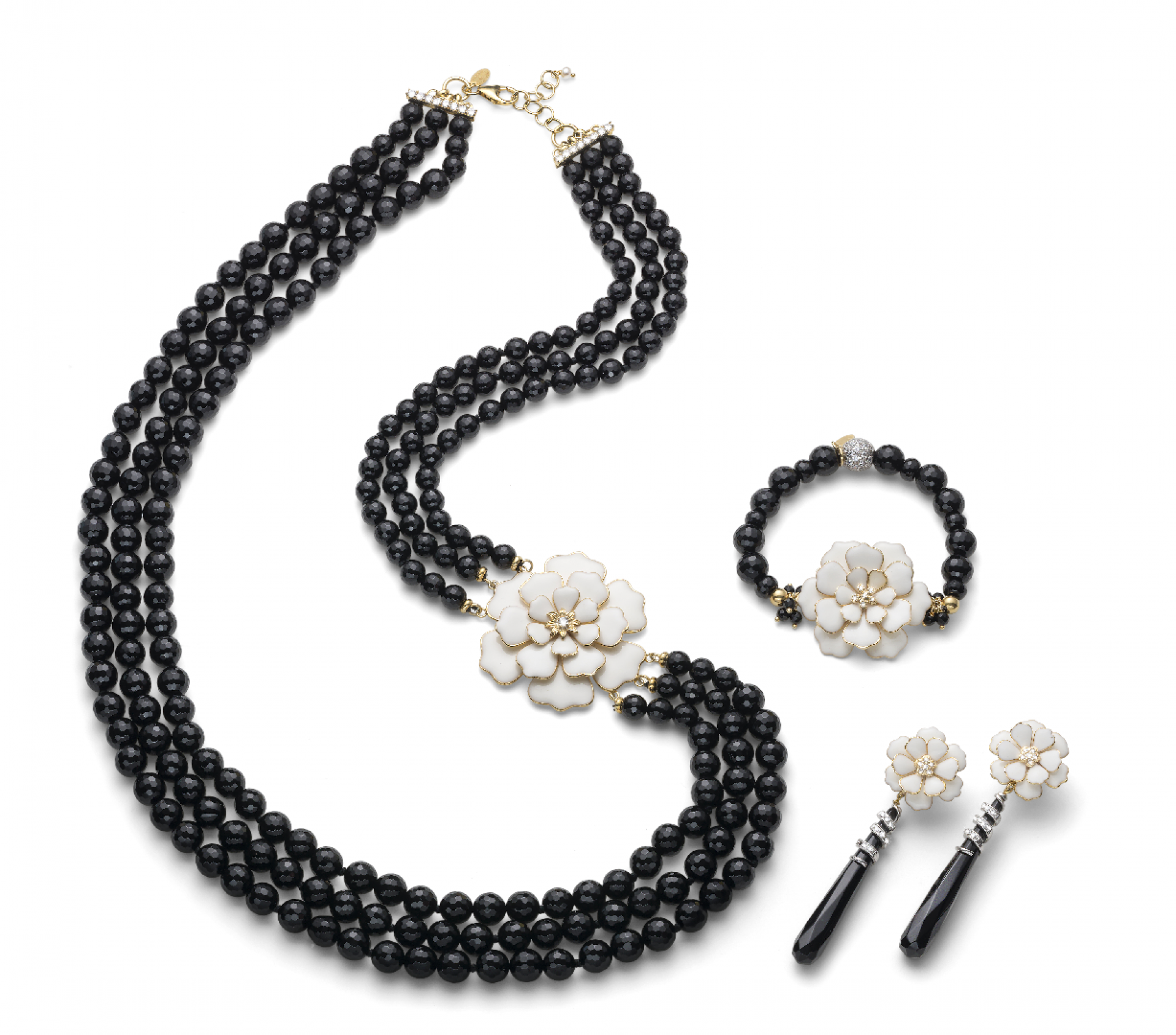 black necklace, earrings and rings with white pearls, white flowers, precious stones and golden details