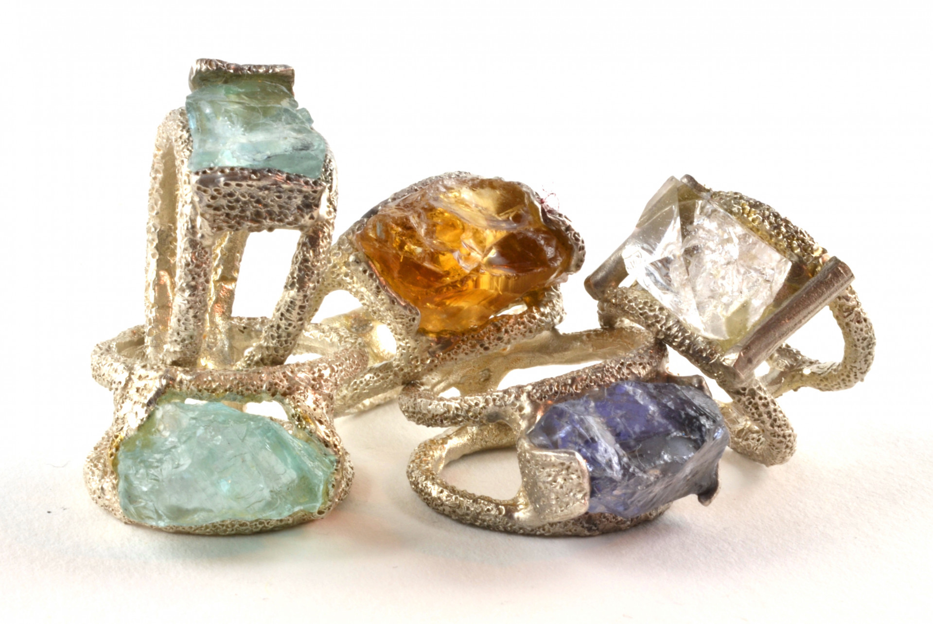 set of colorful rings with precious stones
