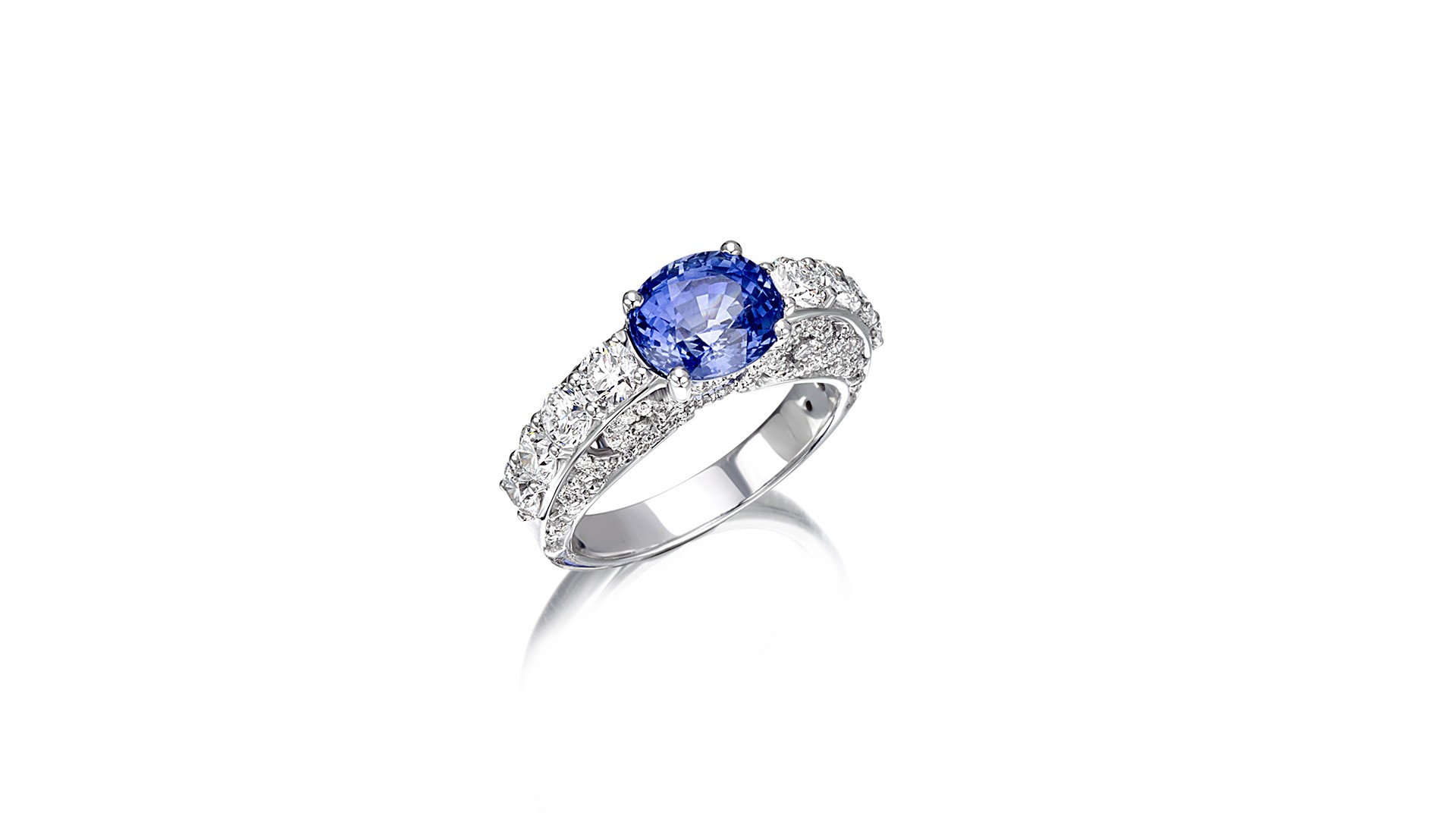 silver ring with precious stones and blue stone